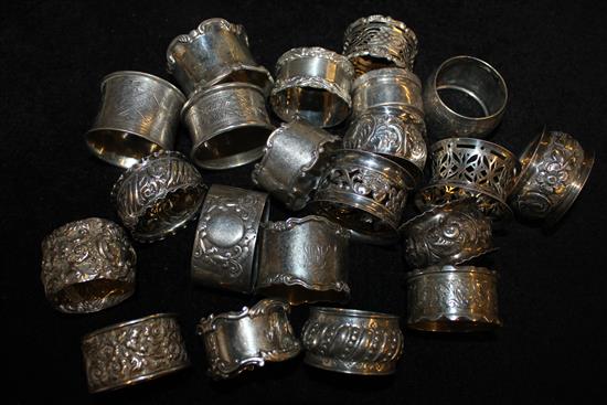 21 assorted silver napkin rings